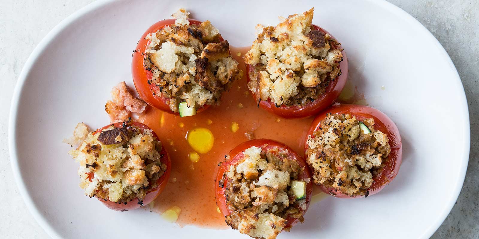 Sausage-Stuffed Tomatoes with Tomato Jus